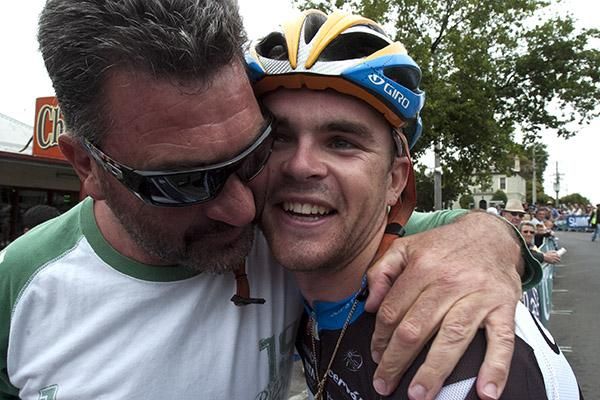 That's my boy: Carl Bobridge (who is not a bad media moto-pilot as well) congratulates his son after a wonderful ride to win the National Men's Road Race Championship.