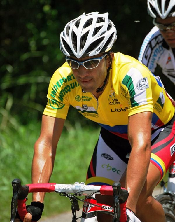 Felix Rafael Cardenas (GW Shimano-Chec-Edeq-Envia) in the race leader's yellow jersey.