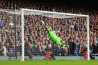 Leighton Baines (unseen) of Everton scores from a freekick past Jussi Jaaskelainen the West Ham United goalkeeper during the Barclays Premier League match between West Ham United and Everton at the Boleyn Ground on September 21, 2013 in London, England.