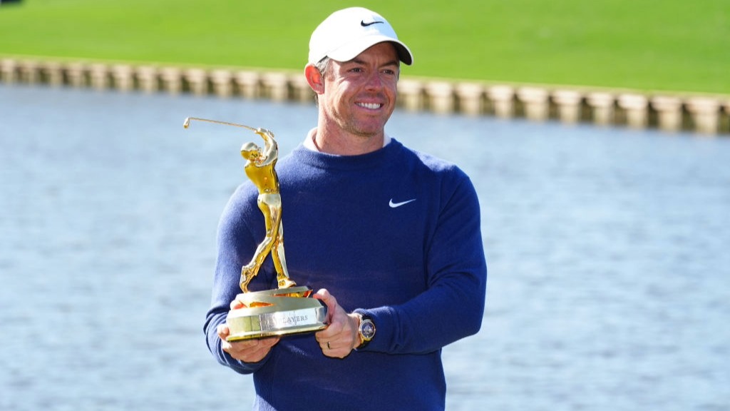 Rory McIlroy holds up the trophy after winning The Players Championship 2026.