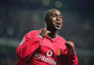 Andy Cole celebrates a Manchester United goal against Anderlecht in September 2000.