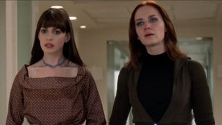 From left to right: Anne Hathaway and Emily Blunt, both looking concerned in The Devil Wears Prada. 