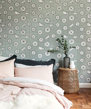 bedroom with blue patterned wallpaper