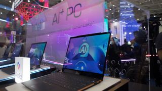 AI-equipped laptops are displayed at the MSI booth during Computex 2024