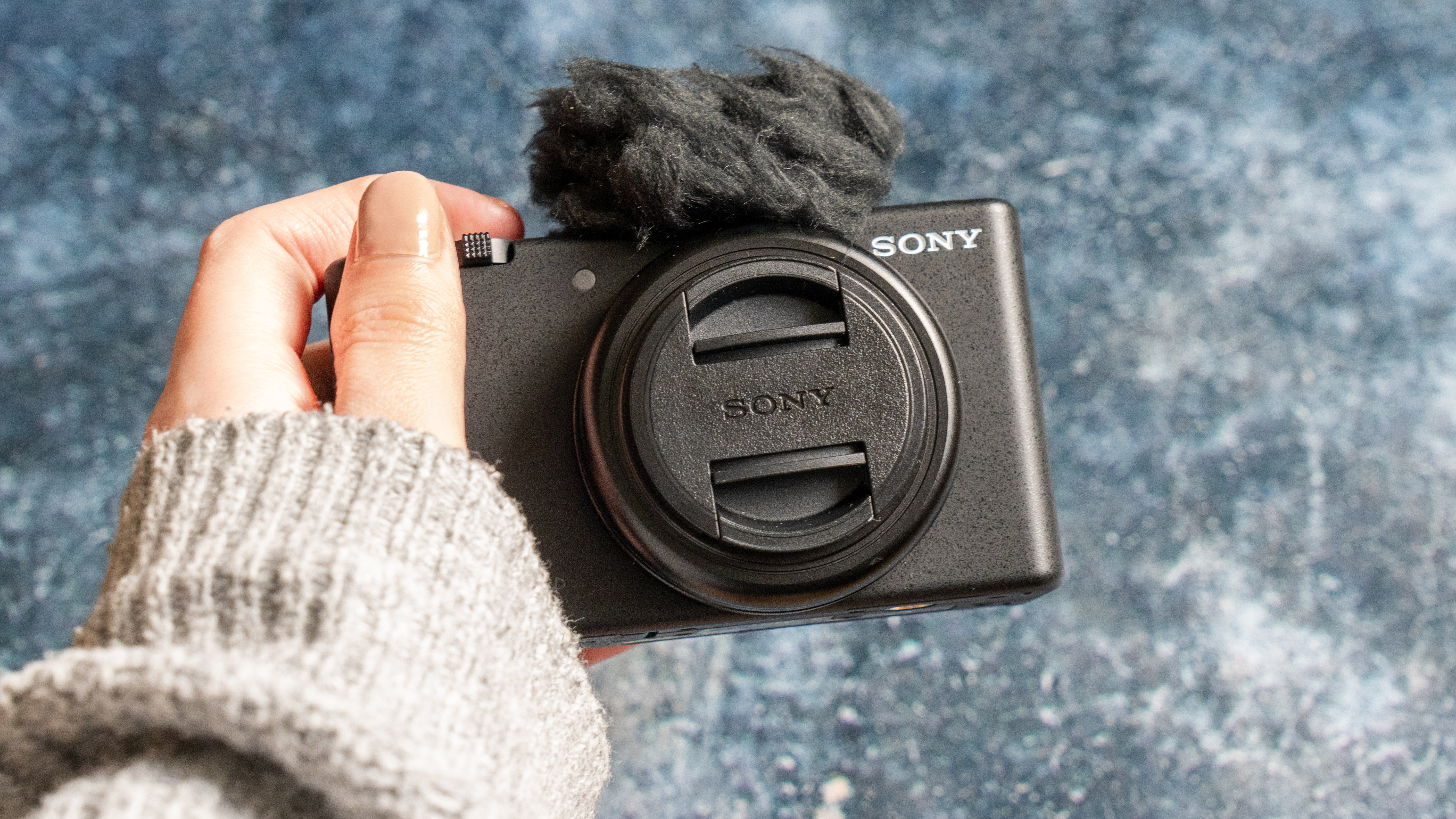 Sony ZV-F1 held in the hand