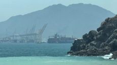 A ship sailing near the Strait of Hormuz off the eastern coast of the United Arab Emirates