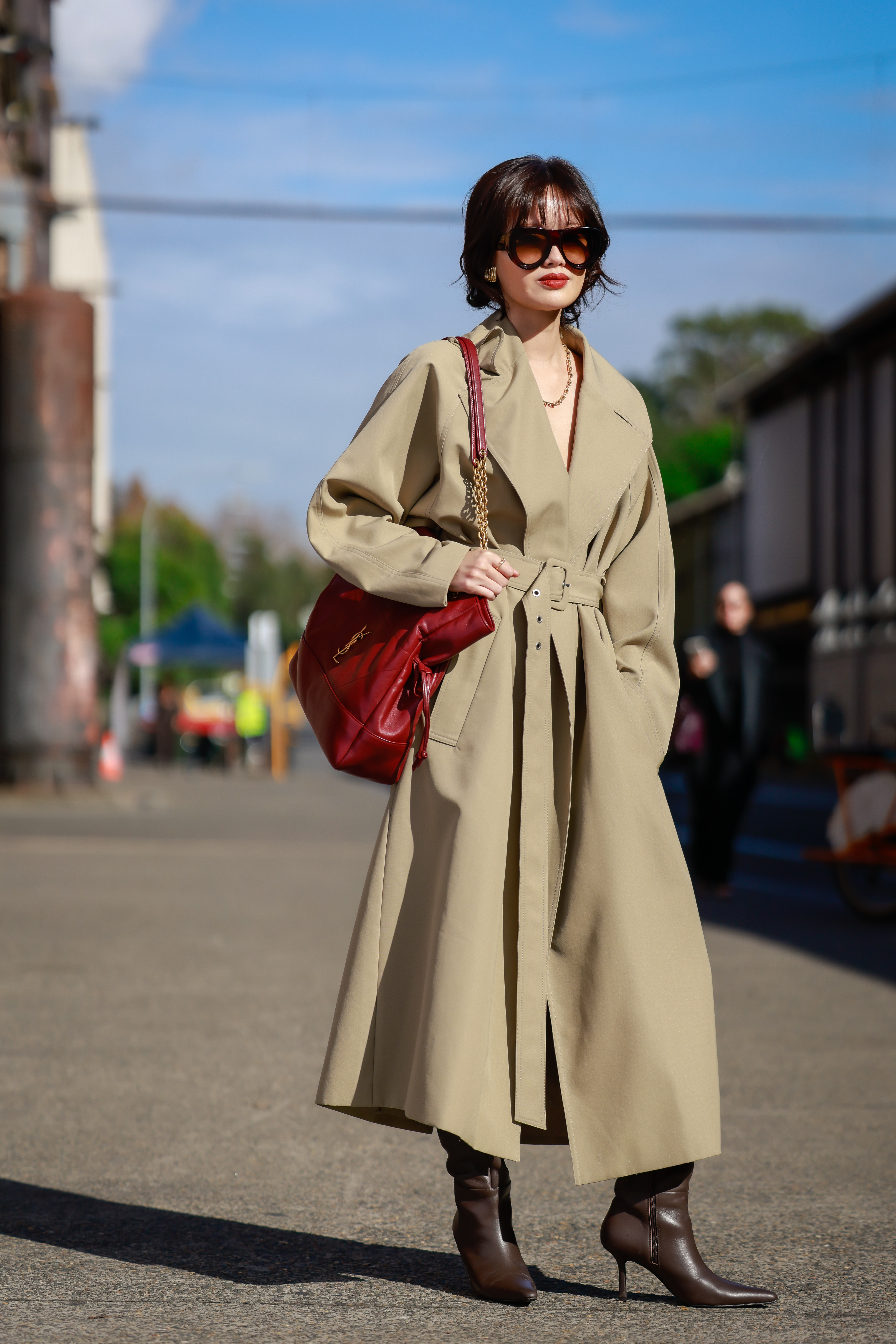 Woman wearing Saint Laurent bag.
