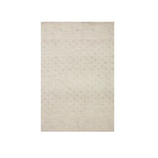 off white rug with subtle geometric pattern