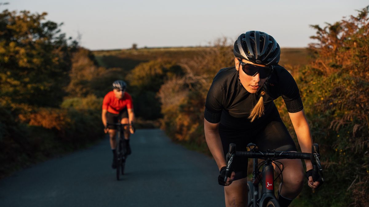 two people cycling