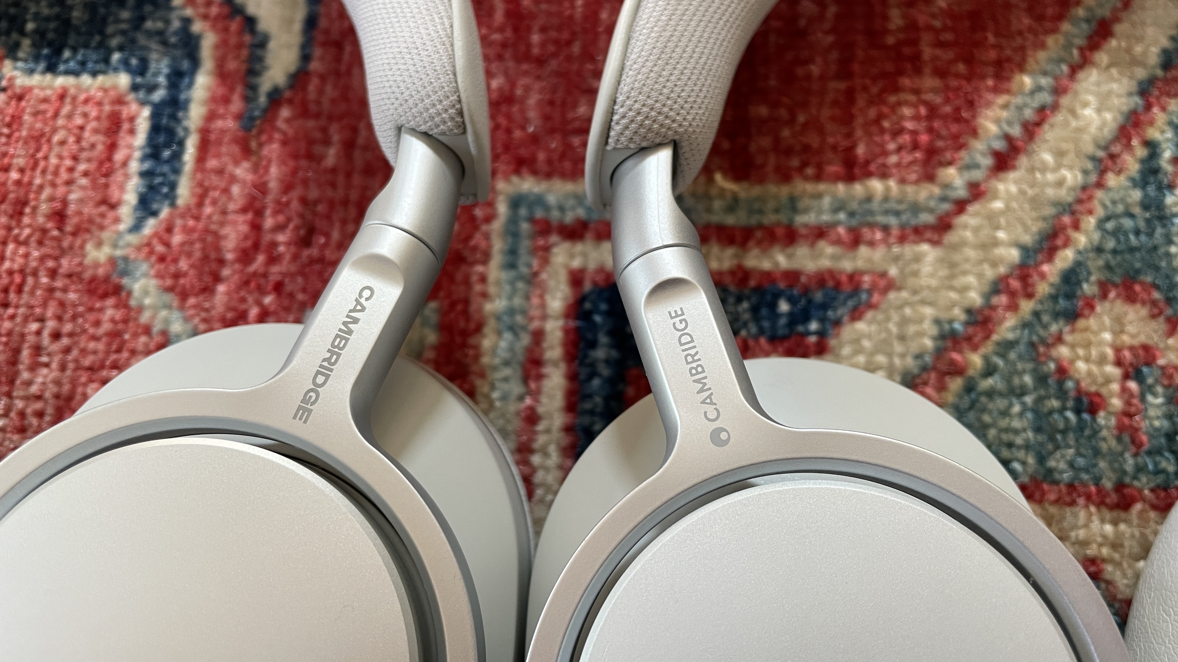 Cambridge Audio Melomania P100 with the original P100, either worn by Becky Scarrott or next to each other, to illustrate the similarities