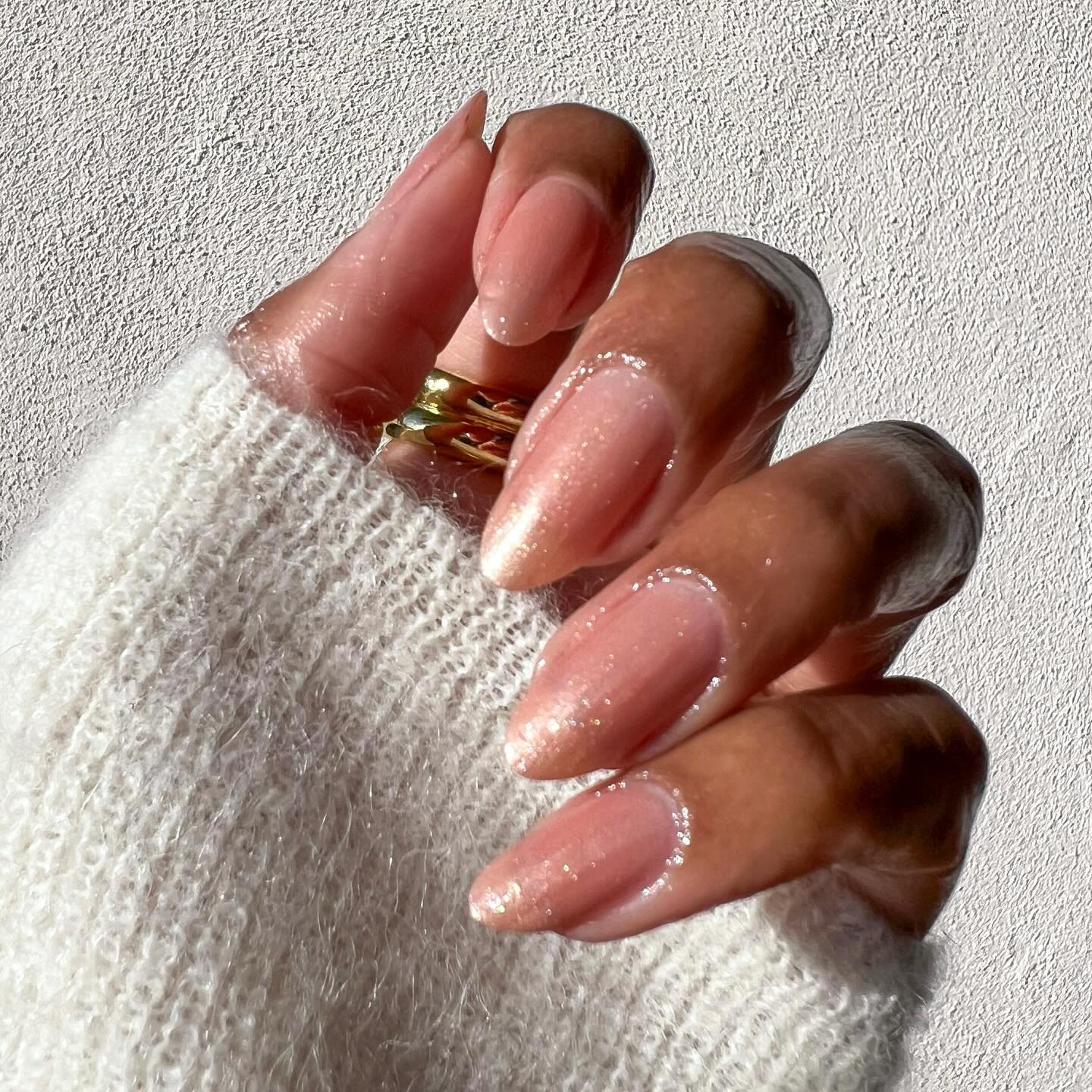 A sheer, shimmery manicure