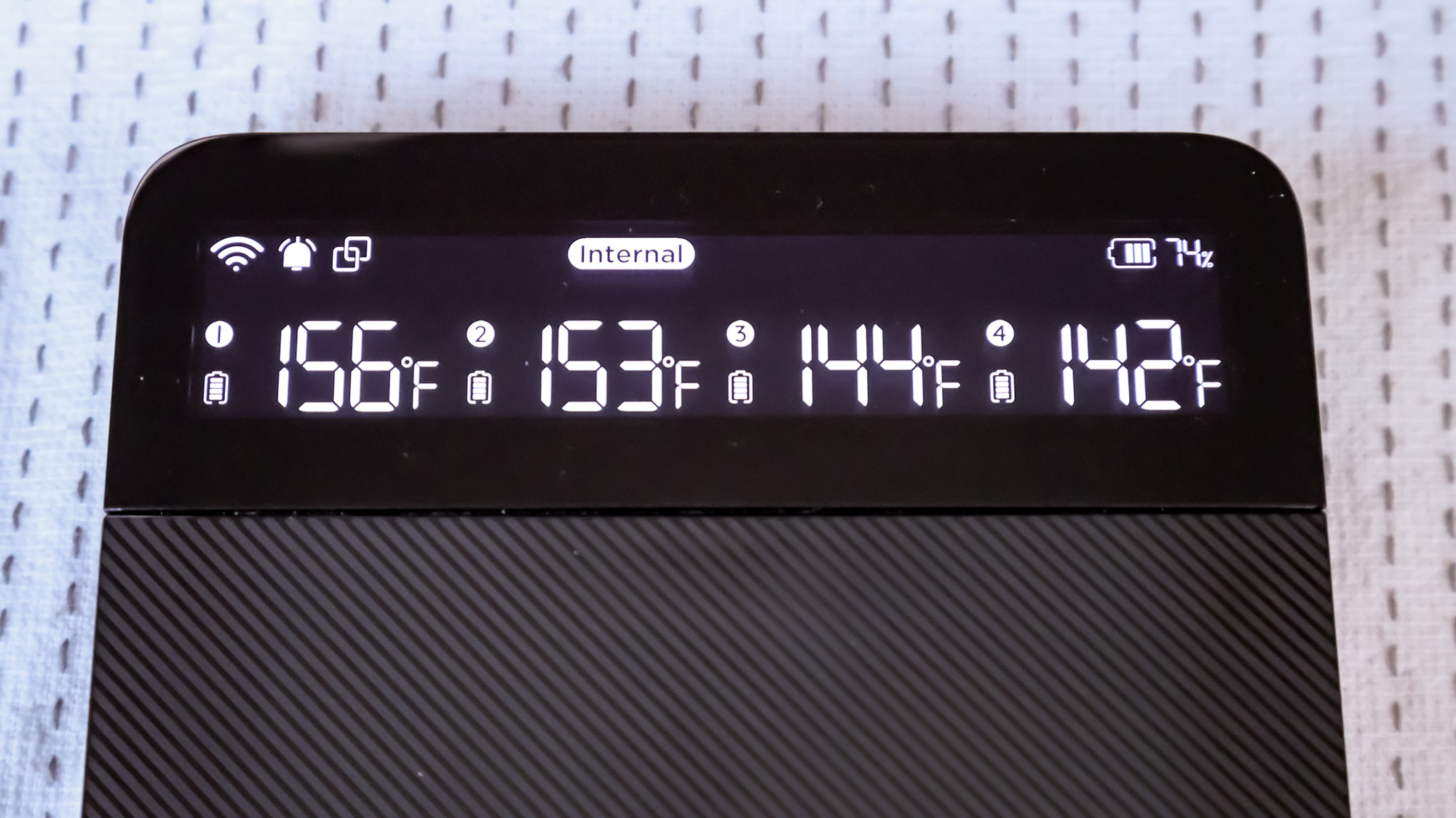 The display on the GoveeLife Smart Wireless Meat Thermometer hub showing temperature readings for each probe