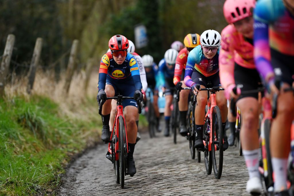 NINOVE BELGIUM FEBRUARY 24 LR Shirin Van Anrooij of The Netherlands and Team LidlTrek and Agnieszka SkalniakSojka of Poland and Team CanyonSRAM Racing compete during the 16th Omloop Het Nieuwsblad 2024 Womens Elite a 1271km one day race from Ghent to Ninove UCIWWT on February 24 2024 in Ninove Belgium Photo by Alex BroadwayGetty Images