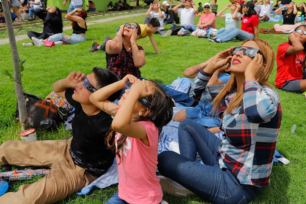 Eclipse watchers gather in Torreon, Mexico. Millions of people have flocked to areas across North America that are in the path of totality in order to experience a total solar eclipse