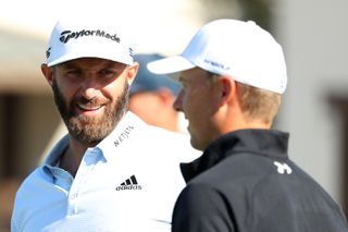 Dustin Johnson, left, talks with Jordan Spieth ahead of the Houston Open at Memorial Park Golf Course on Nov. 4, 2020 in Houston, Texas.