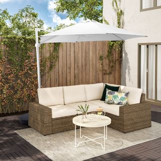 freestanding ikea parasol over patio sofa