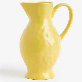 H&M home yellow jug in mottled ceramic material.