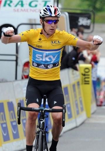 Bradley Wiggins celebrates his overall win in the Criterium du Dauphine