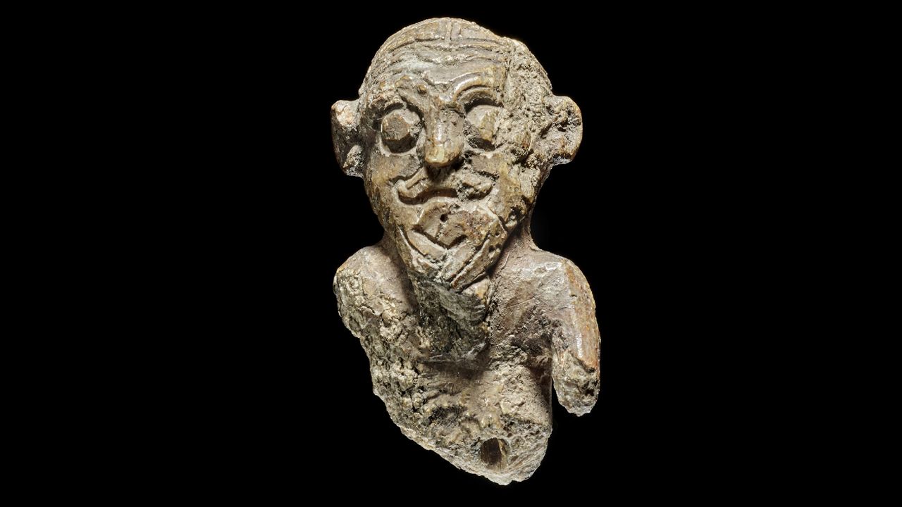 1,000-year-old 'king' game piece with a distinctive hairstyle is 'as close as we will ever get to a portrait of a Viking'