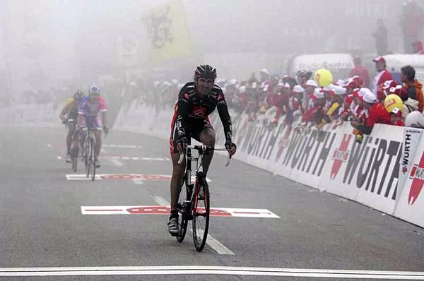 Karpets crosses the line after dropping his team leader