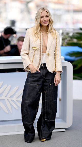 CANNES, FRANCE - MAY 19: Sienna Miller attends the "Horizon: An American Saga" Photocall at the 77th annual Cannes Film Festival at Palais des Festivals on May 19, 2024 in Cannes, France.