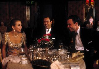 Kate Hardie, Gary and Martin Kemp chat during dinner at a restaurent