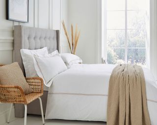 white bedding in light and bright bedroom