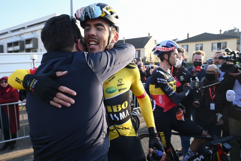 JumboVismas French rider Christophe Laporte C celebrates next to JumboVismas Belgian rider Wout Van Aert R after winning the 1st stage of the 80th edition of the Paris Nice cycling race 160 km between ManteslaVille and ManteslaVille on March 6 2022 Photo by FRANCK FIFE AFP Photo by FRANCK FIFEAFP via Getty Images