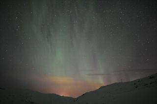 Vivid Auroras Shimmer Over Northern Sweden by Chad Blakley