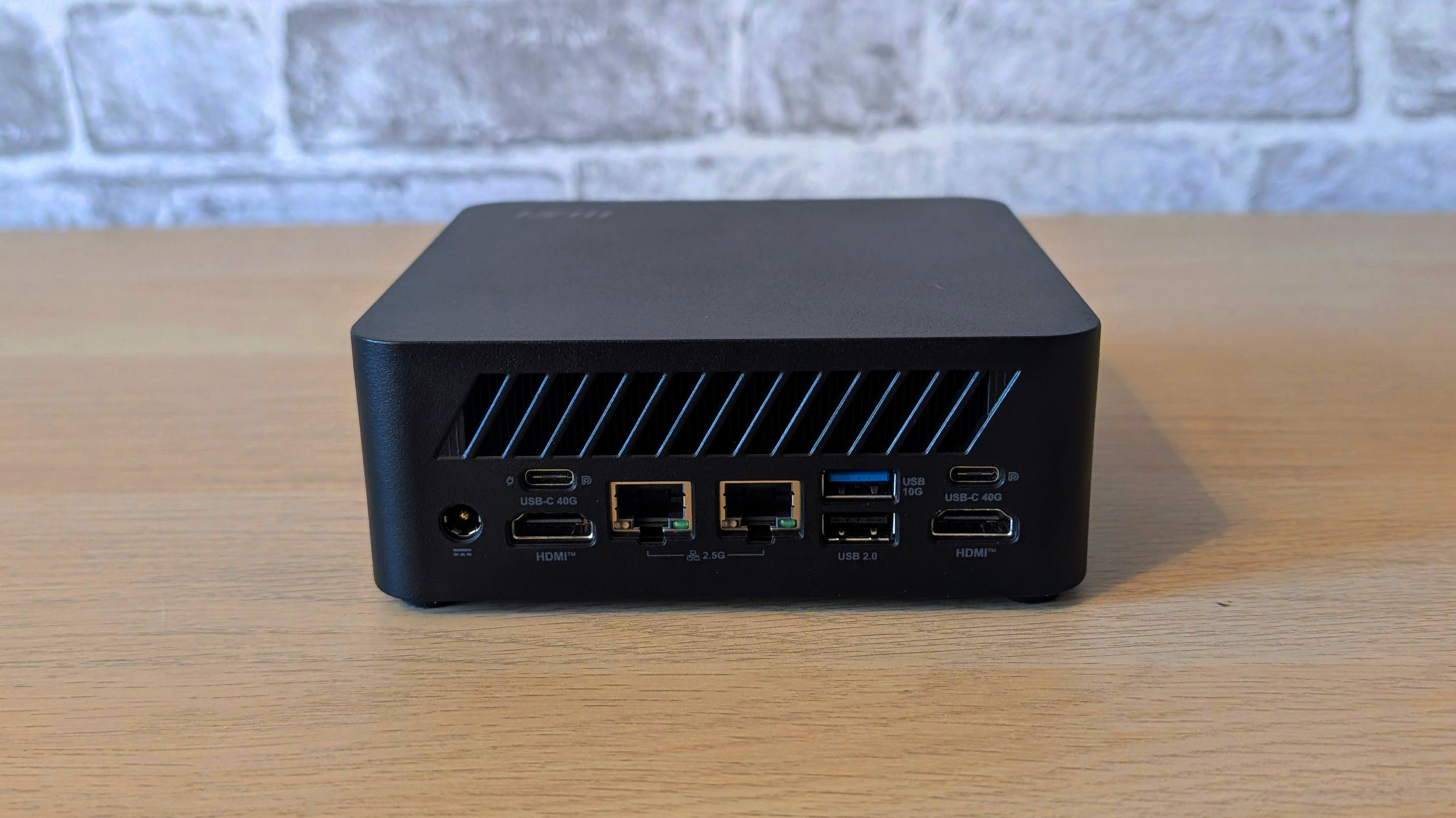 The MSI Cubi Z AI 8M on a desk