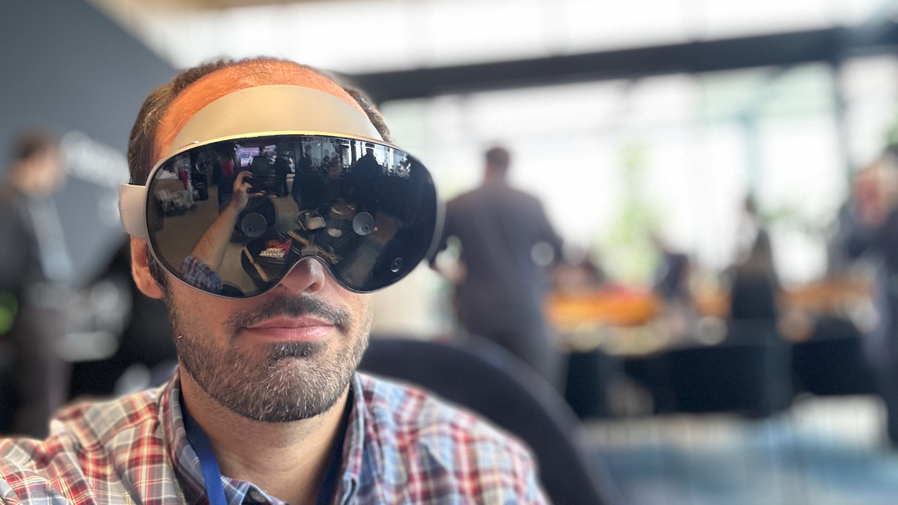A photo of a man wearing the Samsung Galaxy XR headset.