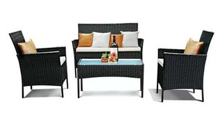 Outdoor sofa and two armchairs and coffee table