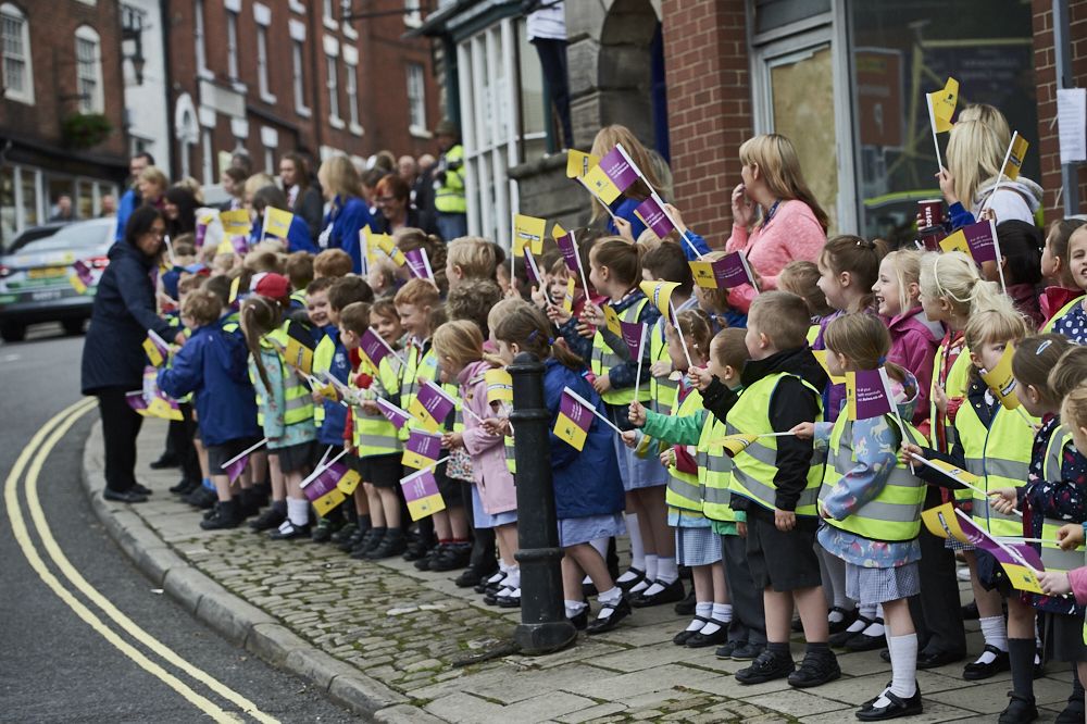 Local schools lined the route