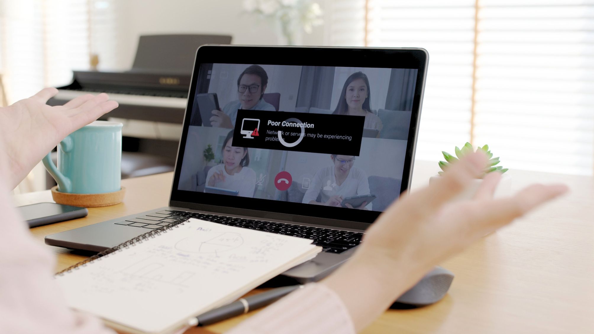 A person is frustrated trying to connect to a video conference call.