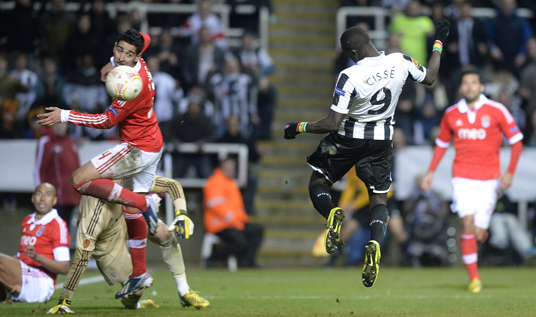 Newcastle striker Papiss Cisse scores for the Magpies