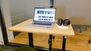 Fully Jarvis Bamboo standing desk in office