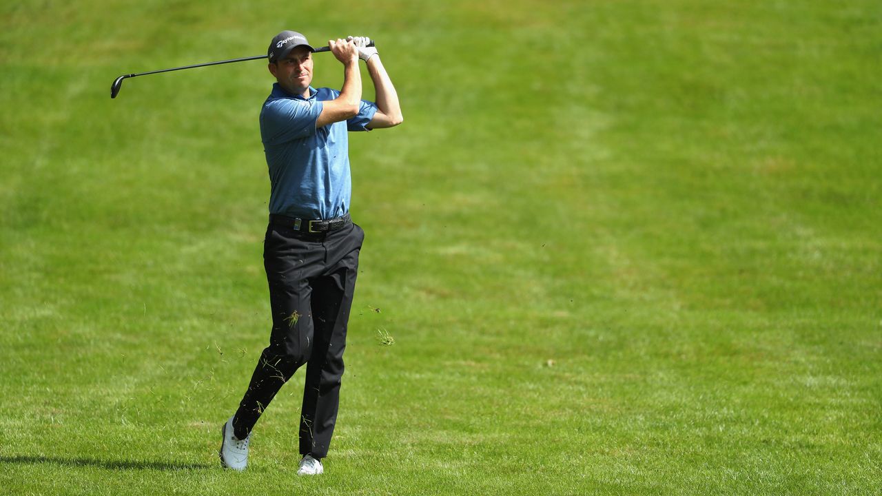 David Howell hitting a hybrid out the rough at the 2016 BMW Championship