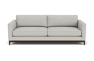 A contemporary pale grey sofa