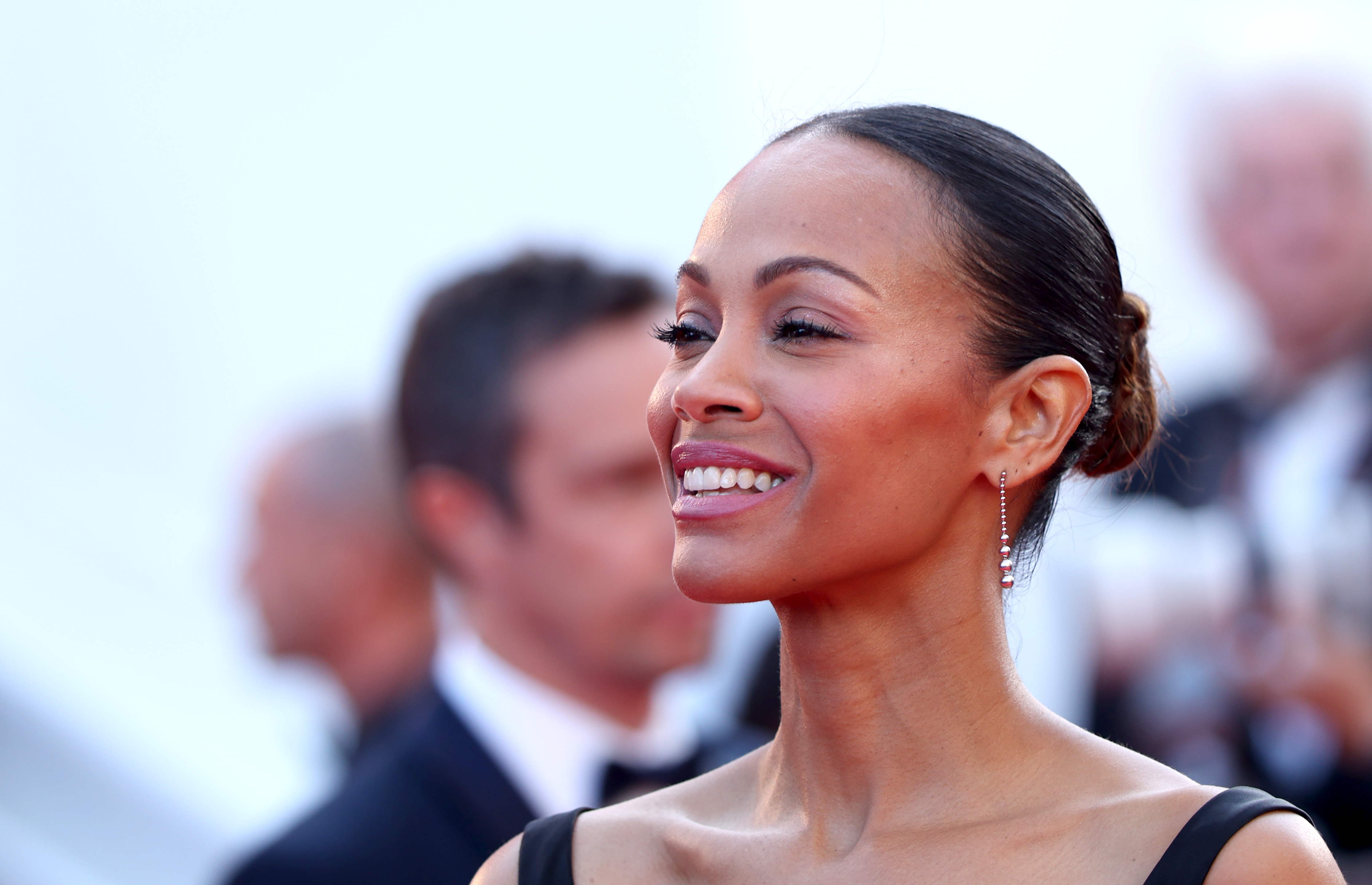 Zoe Salda&amp;ntilde;a attending an event