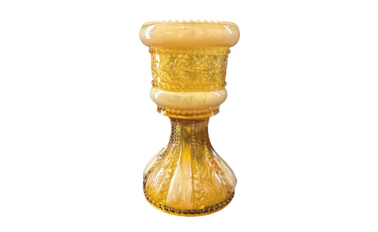 An antique toothpick holder. Rare toothpick holders like this, made in 1903 by Indiana Tumbler &amp; Goblet Works, have sold at auctions for up to $15,000. KRR388.collectibles.toothpickholder