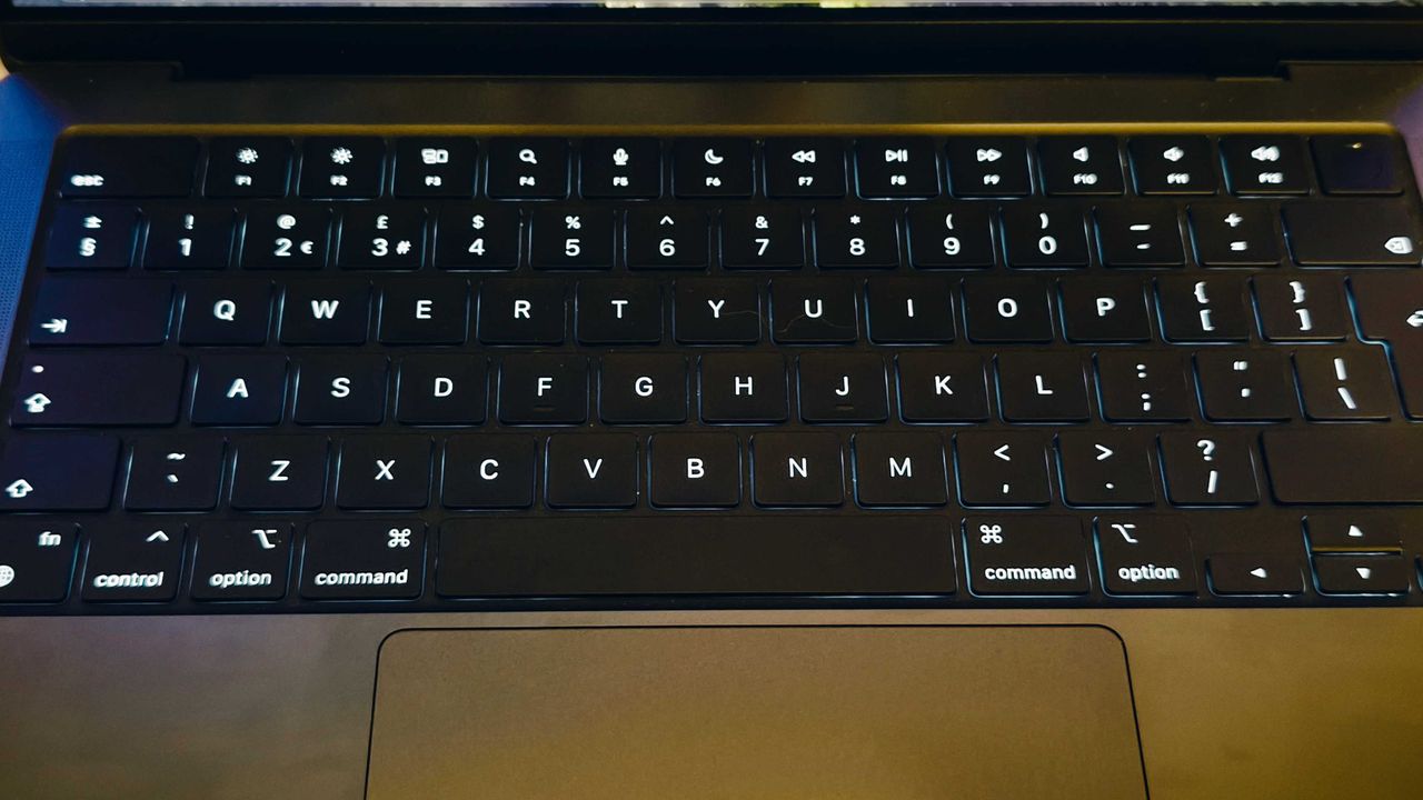 A MacBook Pro 14 (M4, 2024) on a desk