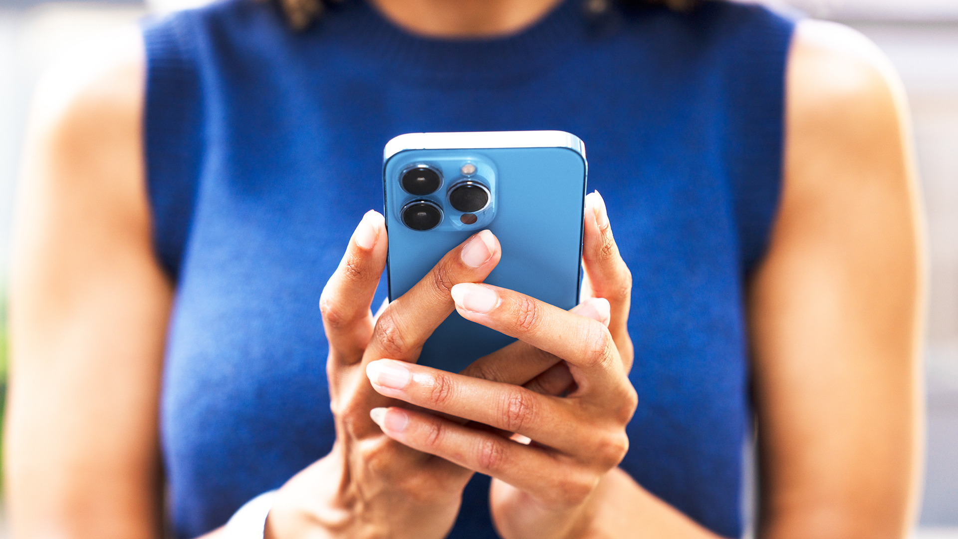 Woman using iPhone