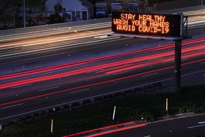 A coronavirus warning sign in San Diego.