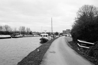 Canal with boats in it taken on Ilford XP2 Super 35mm film