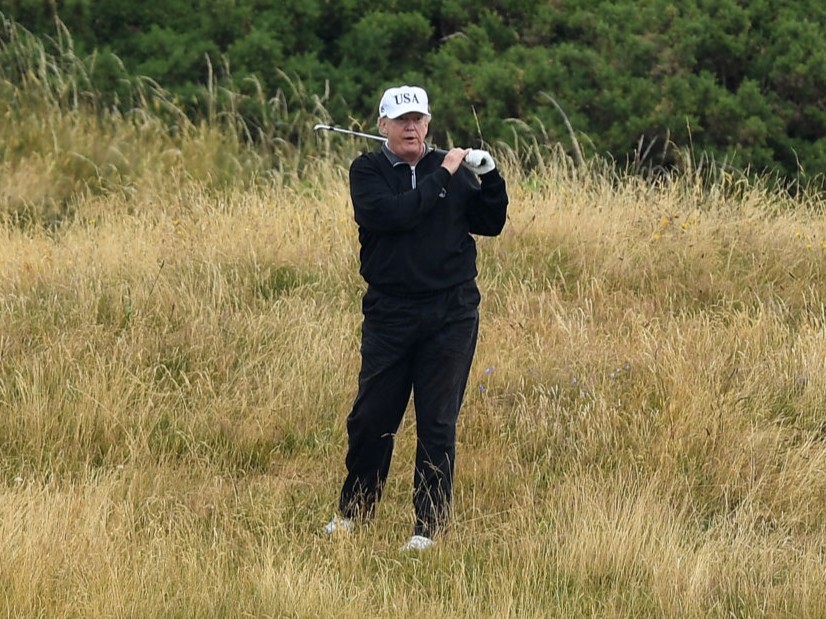 Donald Trump playing from the rough at Trump Turnberry