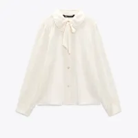Button Blouse With Bow, $36.90 (£29.99) | Zara