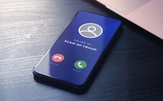 cell phone showing a call from a scam number