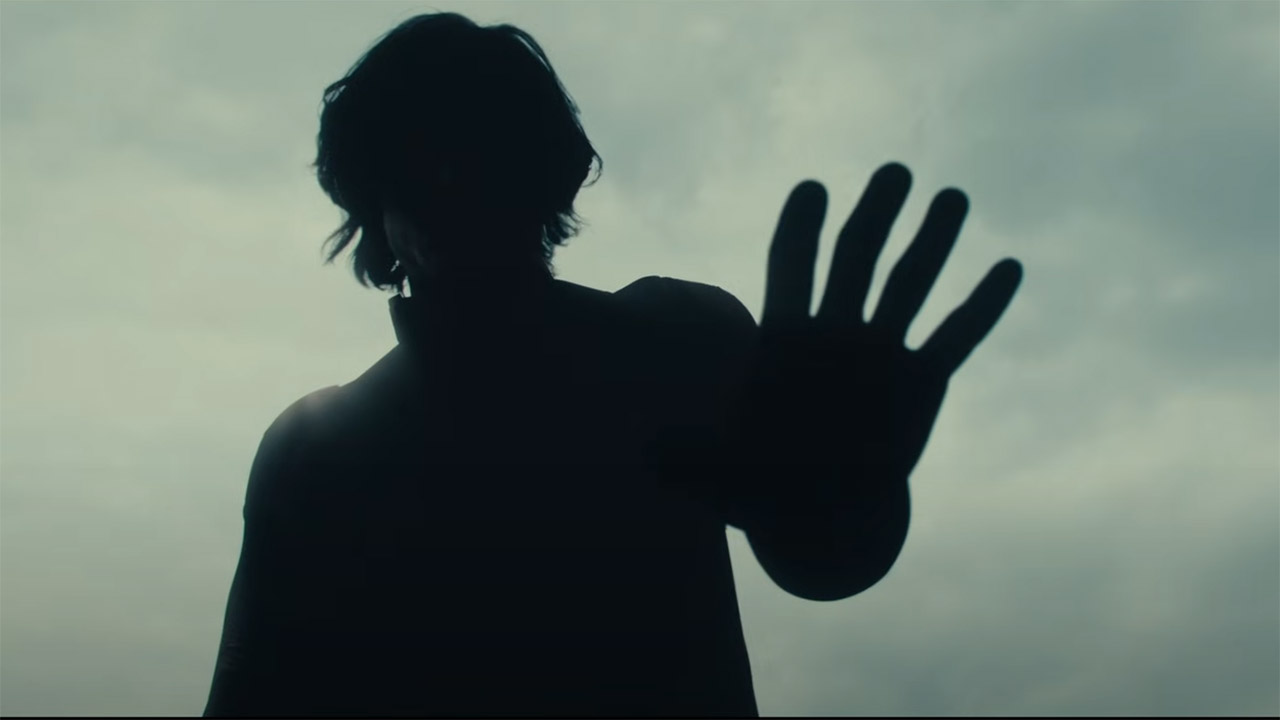 The Void raising his left hand while floating in the sky in Marvel's Thunderbolts* movie