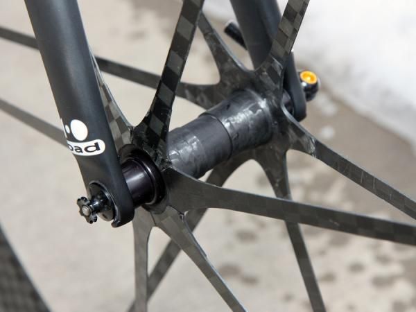 The Mad Fiber hubs are made wholly of bonded carbon fiber save for the bearings and axle assembly.