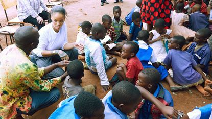 People, Community, Child, Adaptation, Event, Crowd, Room, Sitting, State school, Smile, 